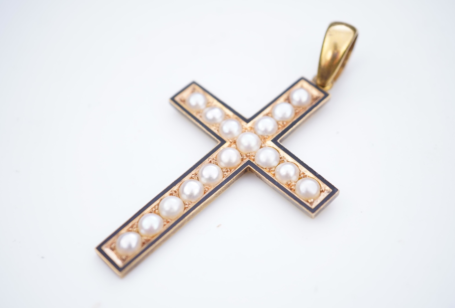 A Victorian pearl and enamel pendant, late 19th century